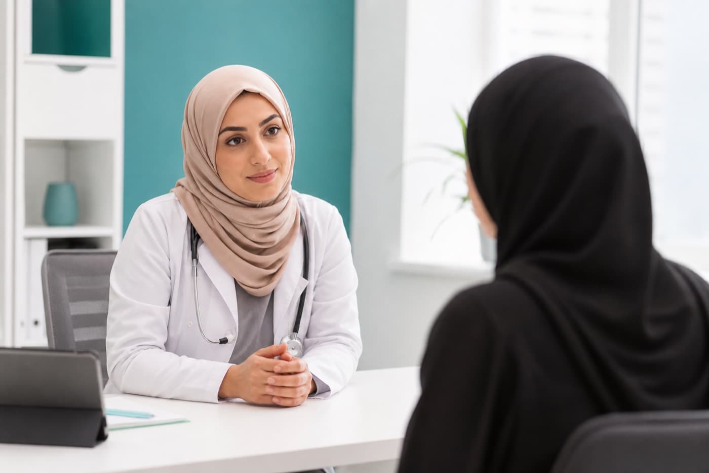 Clinical staff at International Hospital reviewing a patient chart